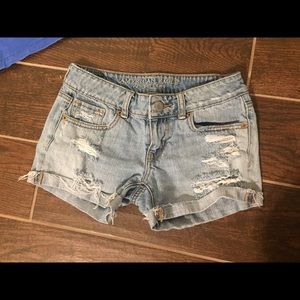 American Eagle distressed jean midi shorts size 00
